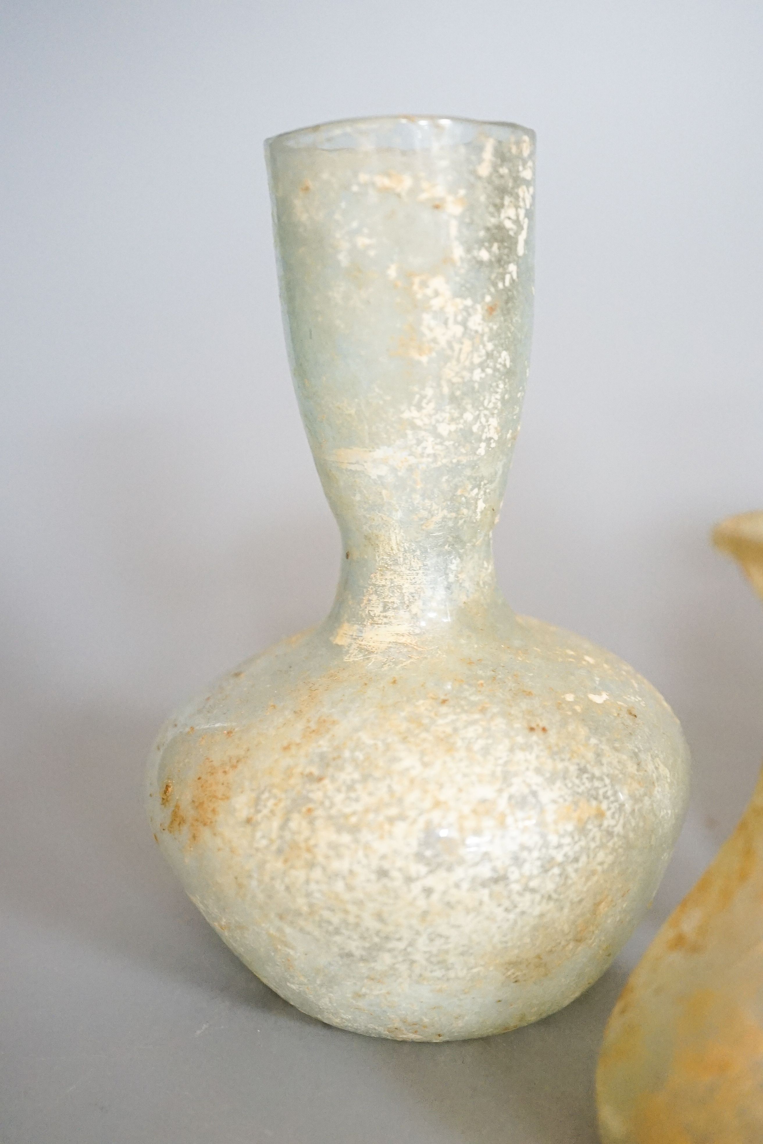 Three Roman glass vessels 14cm